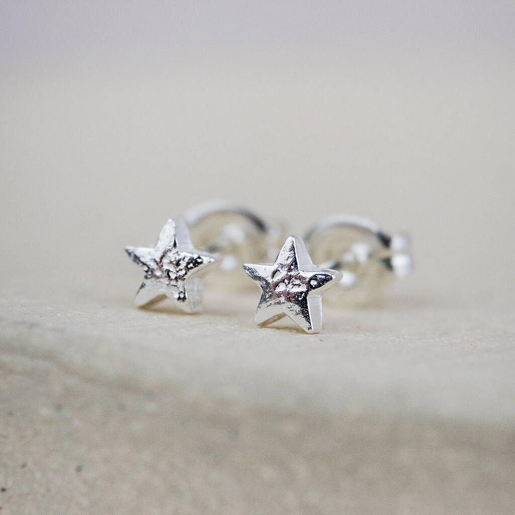 Pendientes de estrella en oro blanco con brillante