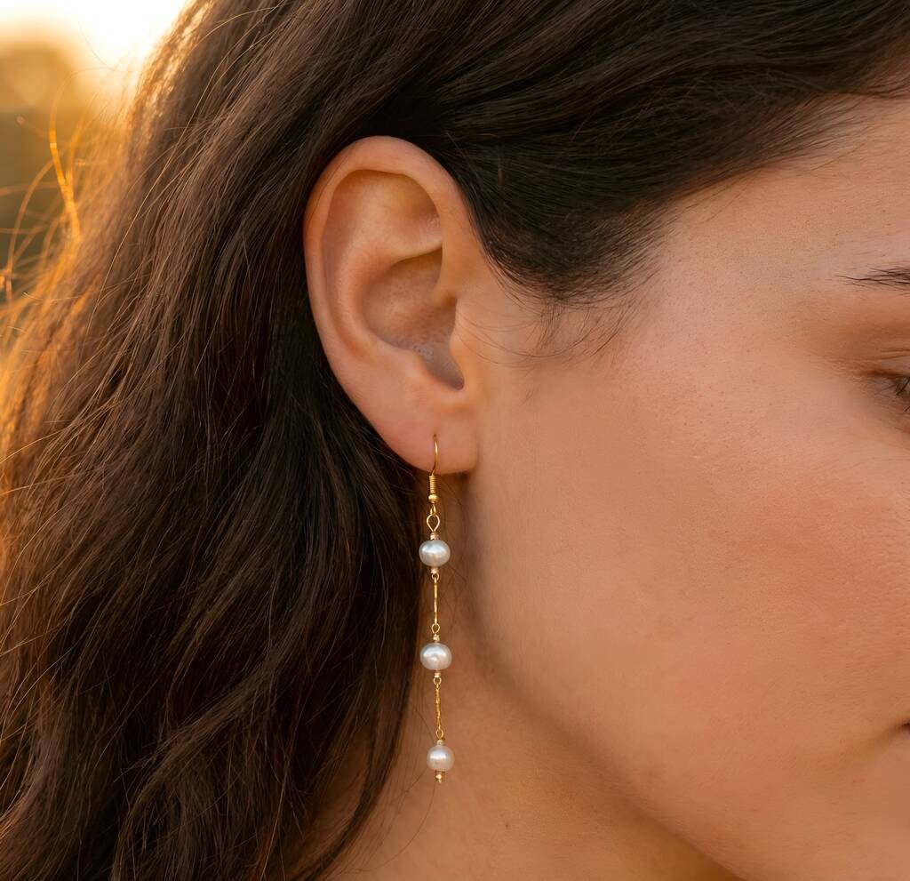 Pendientes largos de oro amarillo con perlas
